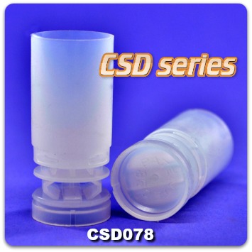 Close-up of two CSD 12 gauge wads.