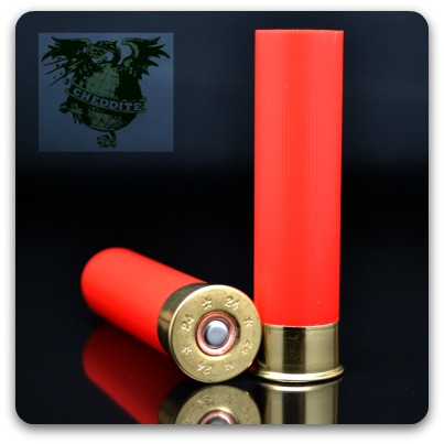 Close-up of two Cheddite 24 gauge hulls.