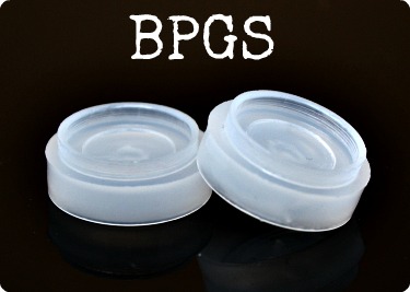Close-up of two 12 gauge gas seals.