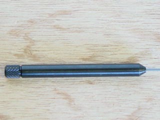 Close-up of Lee decapping tool.