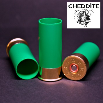 Close-up of three Cheddite 12 gauge 2in green hulls