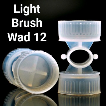Close-up of two Light Brush 12 gauge wads.