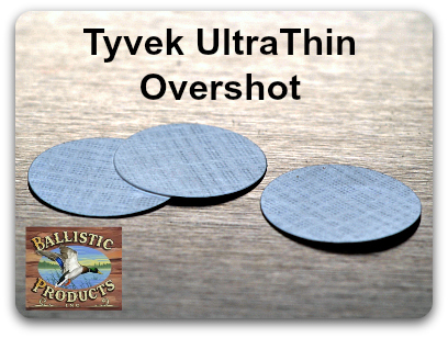 Three thin lightly colored Tyvek Overshot cards.